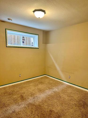 110-10209 92 Avenue, Lac La Biche, AB - Indoor Photo Showing Other Room