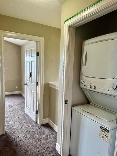 110-10209 92 Avenue, Lac La Biche, AB - Indoor Photo Showing Laundry Room