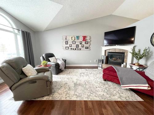 236 Shetland Garden, Fort Mcmurray, AB - Indoor Photo Showing Living Room With Fireplace