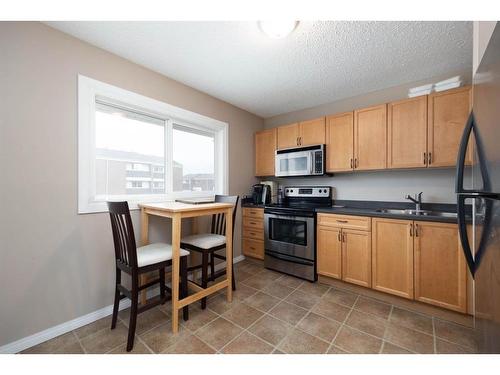 72-400 Silin Forest Road, Fort Mcmurray, AB - Indoor Photo Showing Kitchen With Double Sink