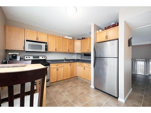 72-400 Silin Forest Road, Fort Mcmurray, AB - Indoor Photo Showing Kitchen With Stainless Steel Kitchen