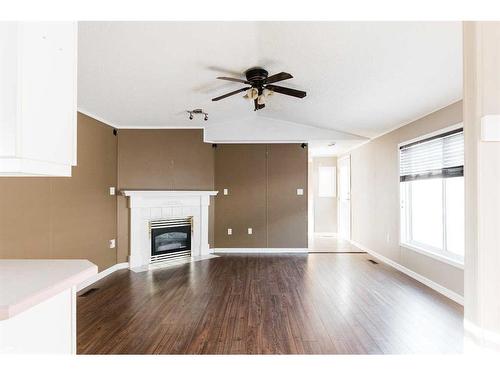 397 Cree Road, Fort Mcmurray, AB - Indoor Photo Showing Living Room With Fireplace