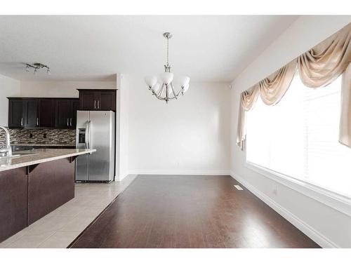 11-300 Sparrow Hawk Drive, Fort Mcmurray, AB - Indoor Photo Showing Kitchen With Double Sink