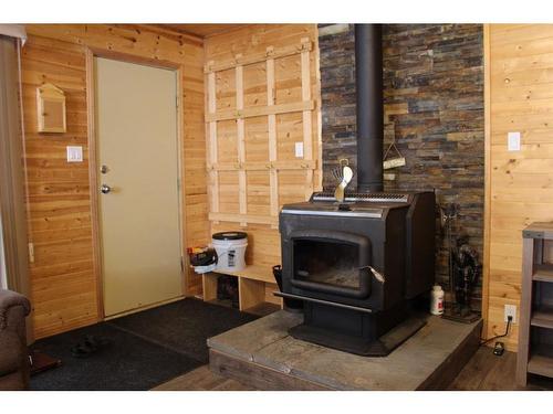 650017 Range Road 185, Rural Athabasca County, AB - Indoor With Fireplace