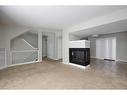 16-120 Warren Way, Fort Mcmurray, AB  - Indoor Photo Showing Living Room With Fireplace 