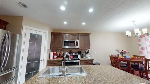 169 Dakin Drive, Fort Mcmurray, AB - Indoor Photo Showing Kitchen With Stainless Steel Kitchen With Double Sink