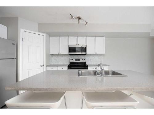 50-240 Laffont Way, Fort Mcmurray, AB - Indoor Photo Showing Kitchen With Upgraded Kitchen