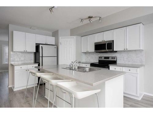 50-240 Laffont Way, Fort Mcmurray, AB - Indoor Photo Showing Kitchen With Double Sink