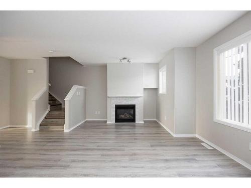 50-240 Laffont Way, Fort Mcmurray, AB - Indoor With Fireplace