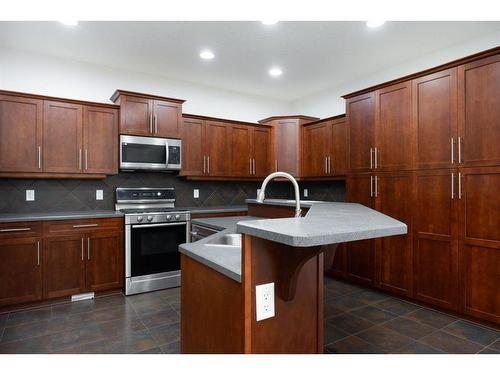 132 Woodpecker Way, Fort Mcmurray, AB - Indoor Photo Showing Kitchen With Double Sink