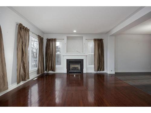 132 Woodpecker Way, Fort Mcmurray, AB - Indoor Photo Showing Living Room With Fireplace