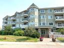 213-9918 Gordon Avenue, Fort Mcmurray, AB  - Outdoor With Balcony With Facade 