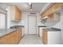 2406-38 Riedel Street, Fort Mcmurray, AB  - Indoor Photo Showing Kitchen With Double Sink 