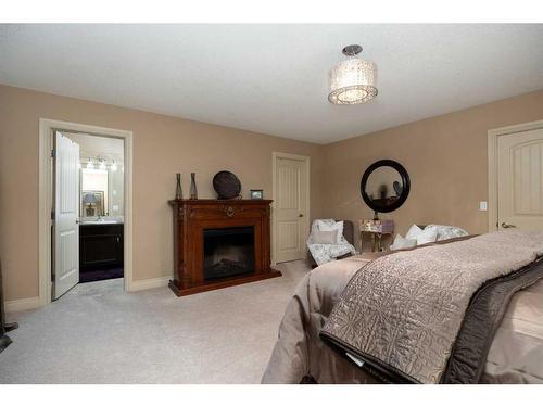 221 Paris Crescent Nw, Fort Mcmurray, AB - Indoor Photo Showing Bedroom With Fireplace