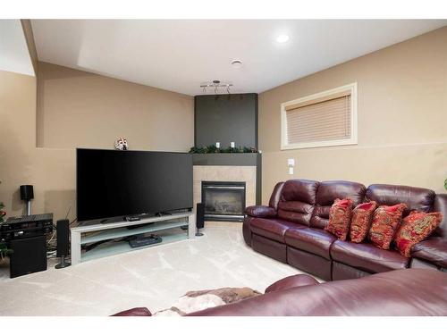 221 Paris Crescent Nw, Fort Mcmurray, AB - Indoor Photo Showing Living Room With Fireplace