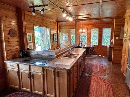 67373 Mission Road, Lac La Biche, AB - Indoor Photo Showing Kitchen With Double Sink