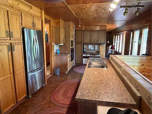 67373 Mission Road, Lac La Biche, AB - Indoor Photo Showing Kitchen With Double Sink