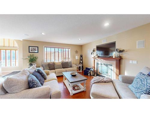 201 Pickles Crescent, Fort Mcmurray, AB - Indoor Photo Showing Living Room With Fireplace