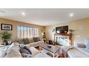 201 Pickles Crescent, Fort Mcmurray, AB  - Indoor Photo Showing Living Room With Fireplace 