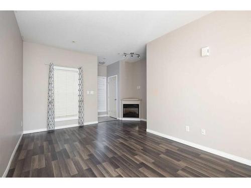 5101-200 Lougheed Drive, Fort Mcmurray, AB - Indoor With Fireplace