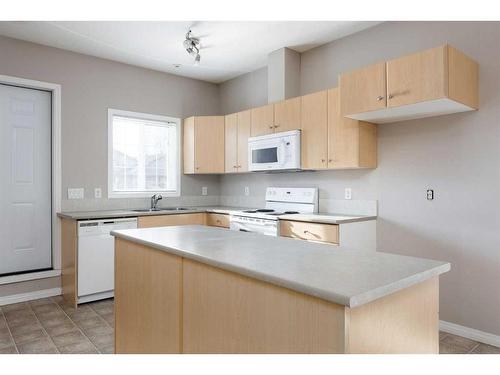 5101-200 Lougheed Drive, Fort Mcmurray, AB - Indoor Photo Showing Kitchen With Double Sink