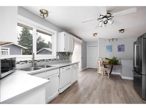 185 Ross Haven Drive, Fort Mcmurray, AB - Indoor Photo Showing Kitchen With Double Sink