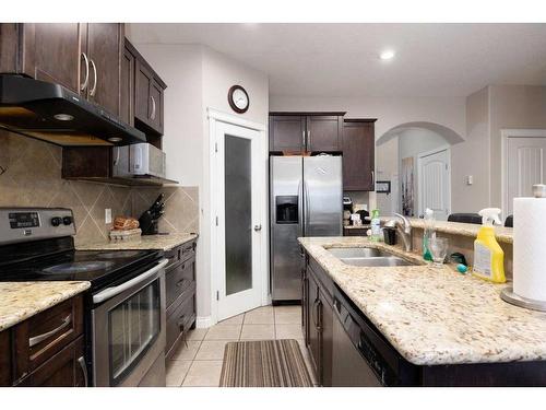 175 Loutit Road, Fort Mcmurray, AB - Indoor Photo Showing Kitchen With Stainless Steel Kitchen With Double Sink With Upgraded Kitchen