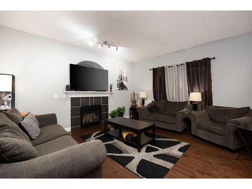 175 Loutit Road, Fort Mcmurray, AB - Indoor Photo Showing Living Room With Fireplace