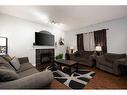 175 Loutit Road, Fort Mcmurray, AB  - Indoor Photo Showing Living Room With Fireplace 