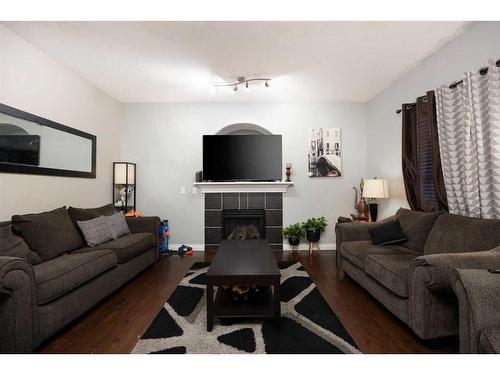 175 Loutit Road, Fort Mcmurray, AB - Indoor Photo Showing Living Room With Fireplace