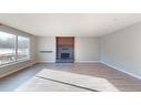 195 Eymundson Road, Fort Mcmurray, AB  - Indoor Photo Showing Living Room With Fireplace 