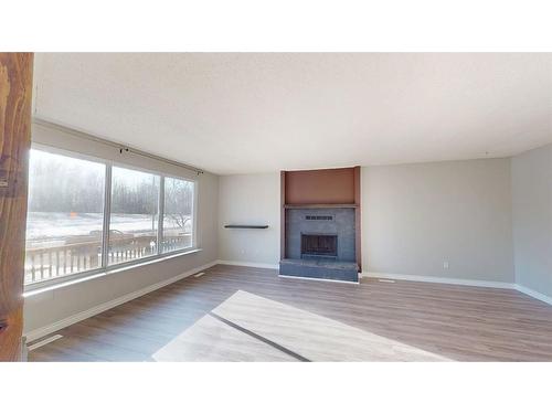 195 Eymundson Road, Fort Mcmurray, AB - Indoor Photo Showing Living Room With Fireplace