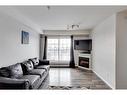 3307-200 Lougheed Drive, Fort Mcmurray, AB  - Indoor Photo Showing Living Room With Fireplace 