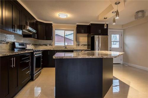 517 Beacon Hill Drive, Fort Mcmurray, AB - Indoor Photo Showing Kitchen With Upgraded Kitchen