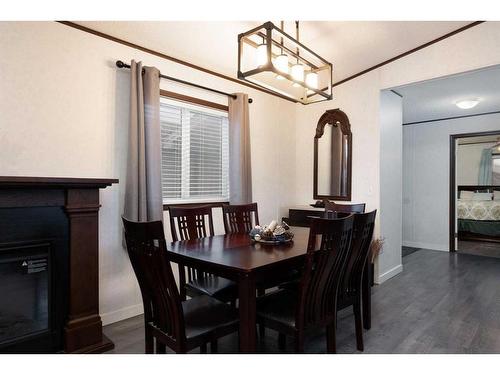 176 Greenbriar Bay, Fort Mcmurray, AB - Indoor Photo Showing Dining Room With Fireplace