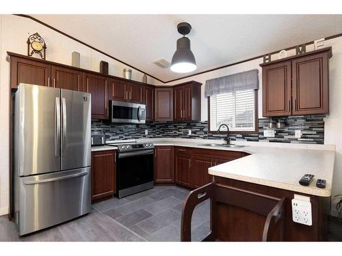 176 Greenbriar Bay, Fort Mcmurray, AB - Indoor Photo Showing Kitchen With Stainless Steel Kitchen