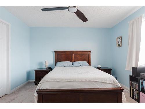 148 Kodiak Crescent, Fort Mcmurray, AB - Indoor Photo Showing Bedroom