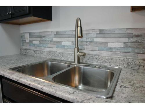 148 Rock Bay, Fort Mcmurray, AB - Indoor Photo Showing Kitchen With Double Sink