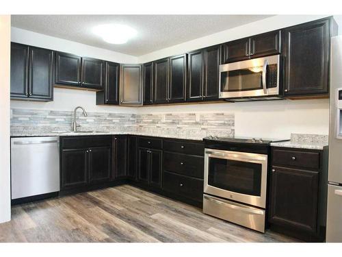 148 Rock Bay, Fort Mcmurray, AB - Indoor Photo Showing Kitchen