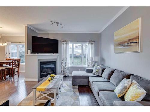 423 Killdeer Way, Fort Mcmurray, AB - Indoor Photo Showing Living Room With Fireplace