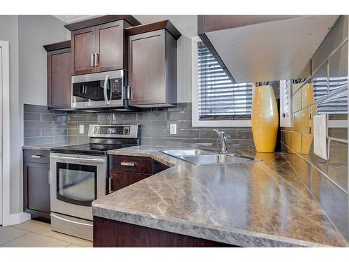 423 Killdeer Way, Fort Mcmurray, AB - Indoor Photo Showing Kitchen With Double Sink