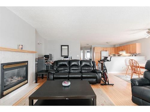 221 Sitka Drive, Fort Mcmurray, AB - Indoor Photo Showing Living Room With Fireplace