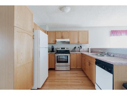 221 Sitka Drive, Fort Mcmurray, AB - Indoor Photo Showing Kitchen With Double Sink