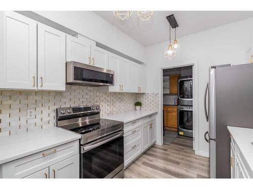 209-290 Plamondon Drive, Fort Mcmurray, AB - Indoor Photo Showing Kitchen With Stainless Steel Kitchen