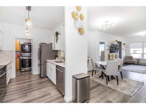 209-290 Plamondon Drive, Fort Mcmurray, AB - Indoor Photo Showing Kitchen With Stainless Steel Kitchen With Double Sink