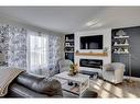 105 Silvertip Place, Fort Mcmurray, AB  - Indoor Photo Showing Living Room With Fireplace 