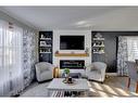 105 Silvertip Place, Fort Mcmurray, AB  - Indoor Photo Showing Living Room With Fireplace 