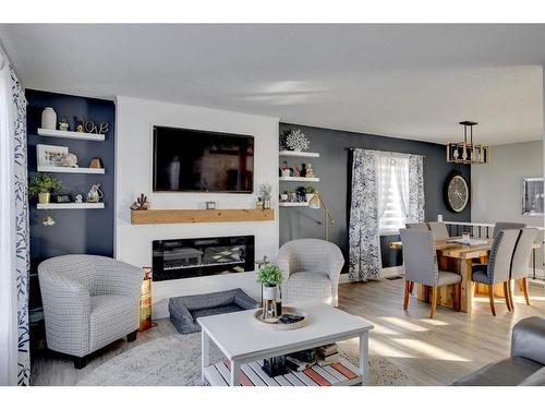 105 Silvertip Place, Fort Mcmurray, AB - Indoor Photo Showing Living Room With Fireplace