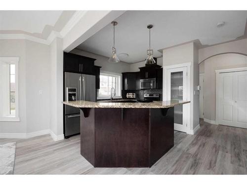 231 Merganser Crescent, Fort Mcmurray, AB - Indoor Photo Showing Kitchen With Upgraded Kitchen