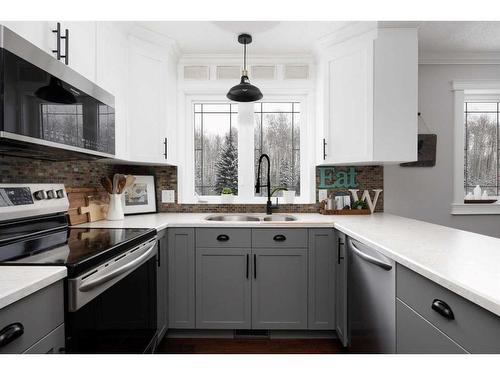 235 Cornwall Drive, Fort Mcmurray, AB - Indoor Photo Showing Kitchen With Double Sink